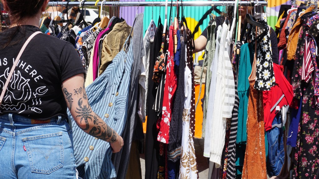 Radical Swapper browses through clothing racks.