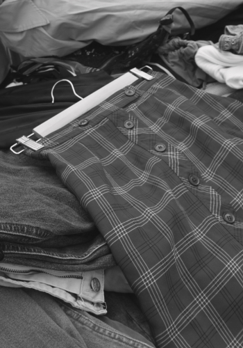 Red Plaid Skirt in Pile of Donations